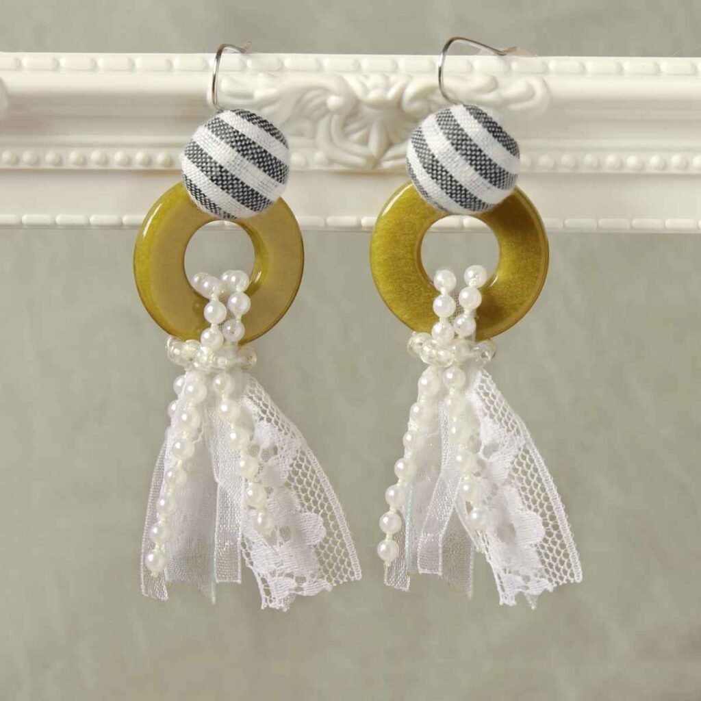 Fabric earrings made with buttons and lace