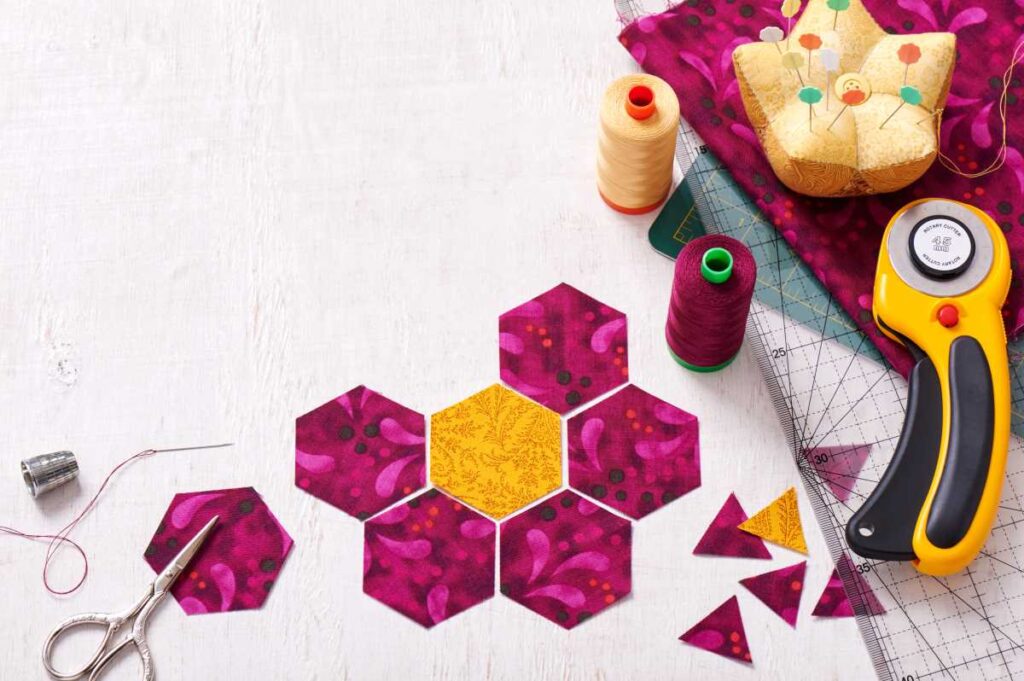 A colorful quilt being pieced together