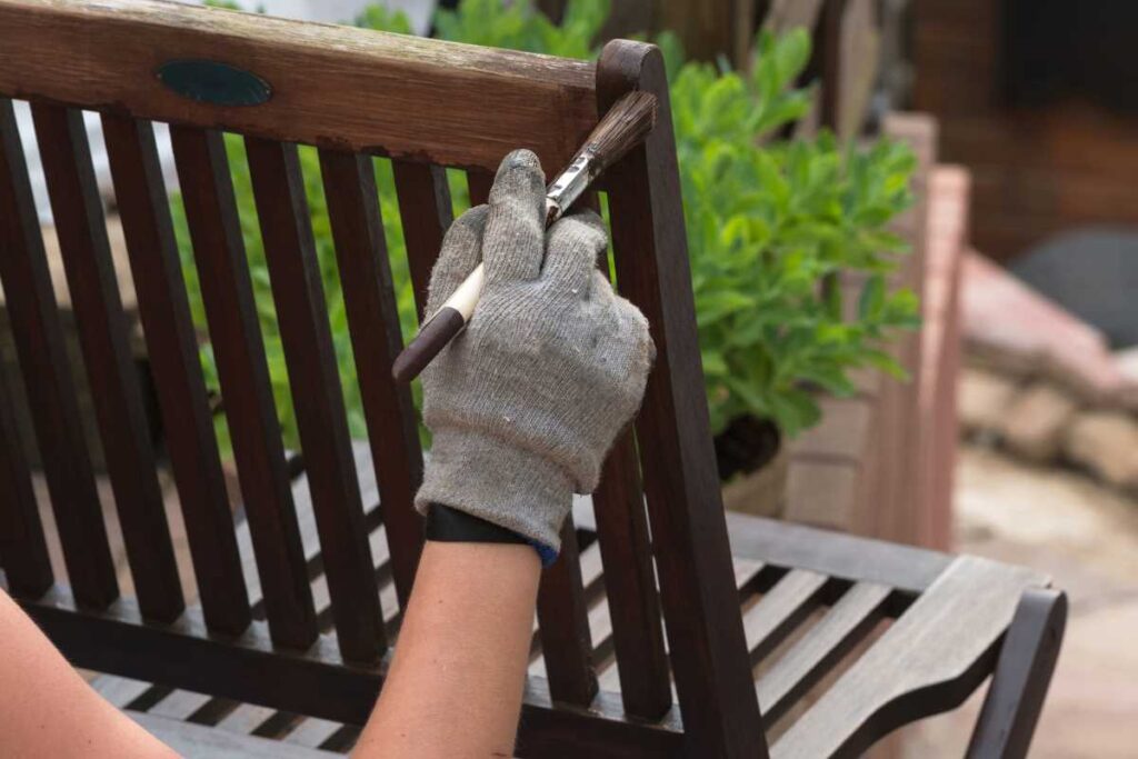 Painting a chair using eco-friendly paint
