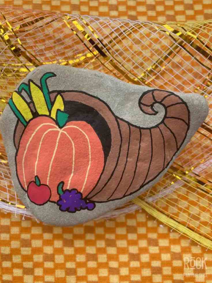 Cornucopia painted on a rock