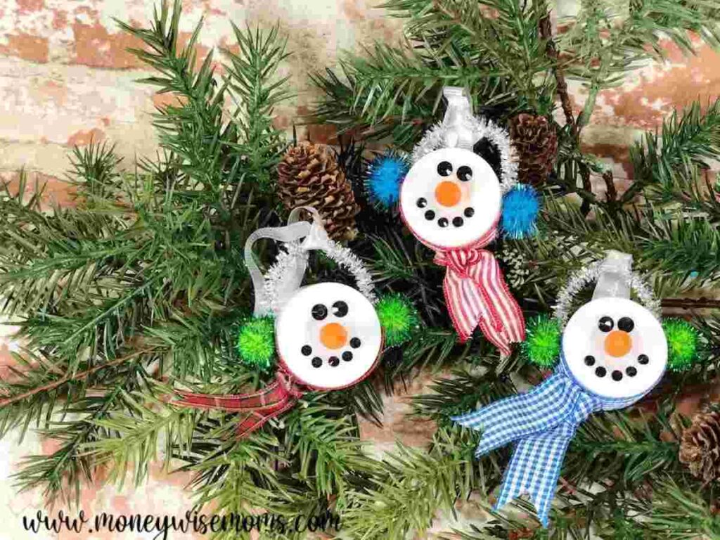 Snowman ornaments made out of tealights