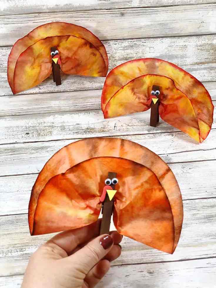 Thanksgiving turkeys made with clothespins and coffee filters