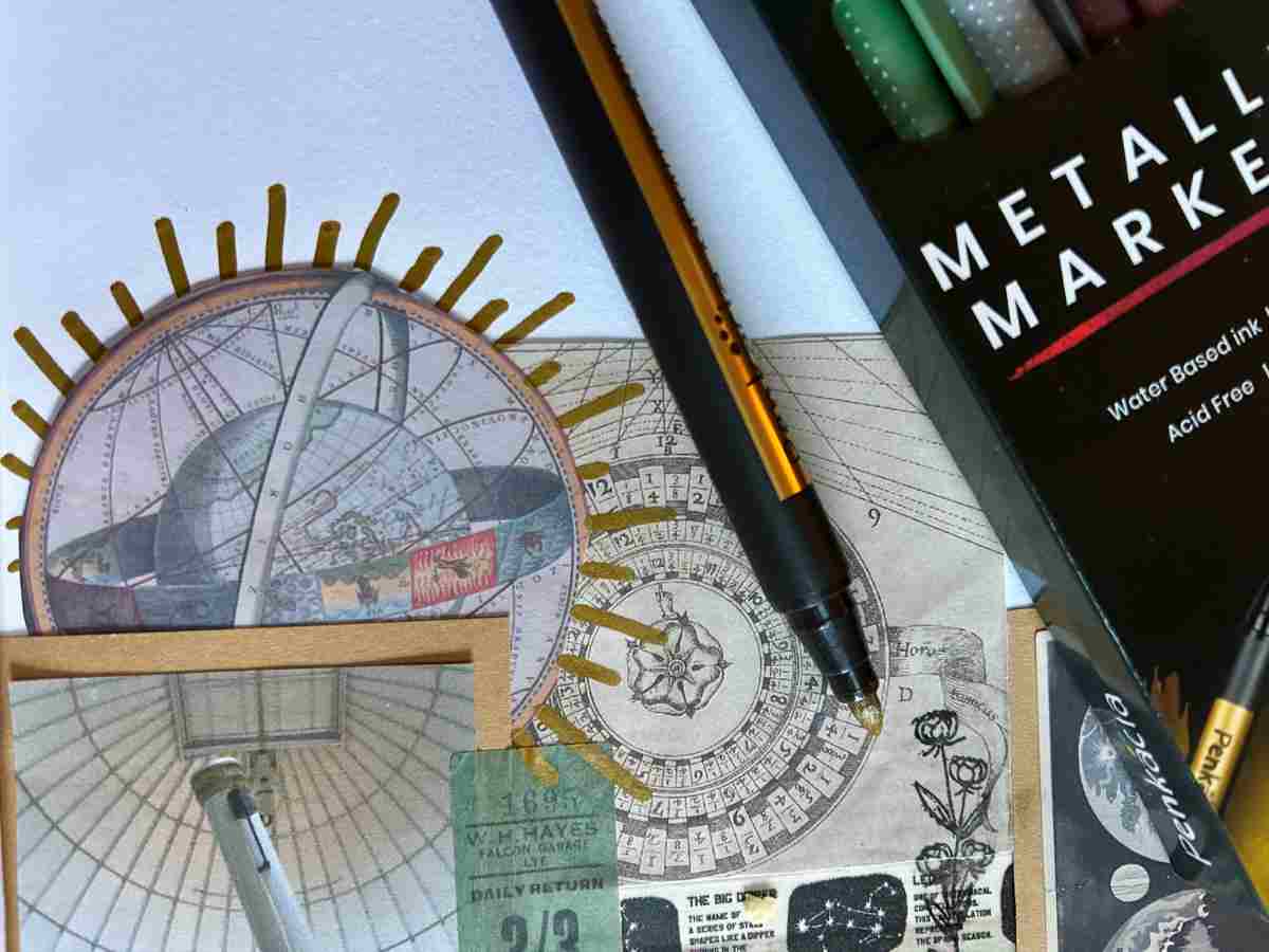 Using metallic markers to decorate a scrapbooking page. Scrapbooking tools