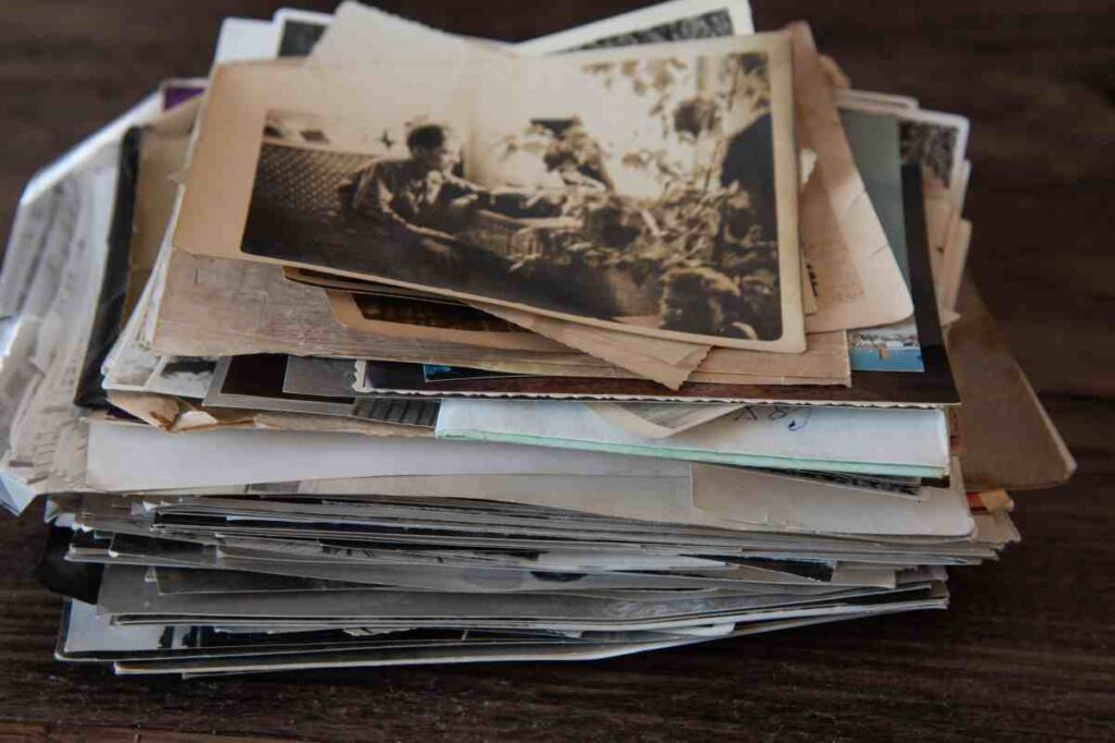 A stack of photos to be organized for scrapbooking