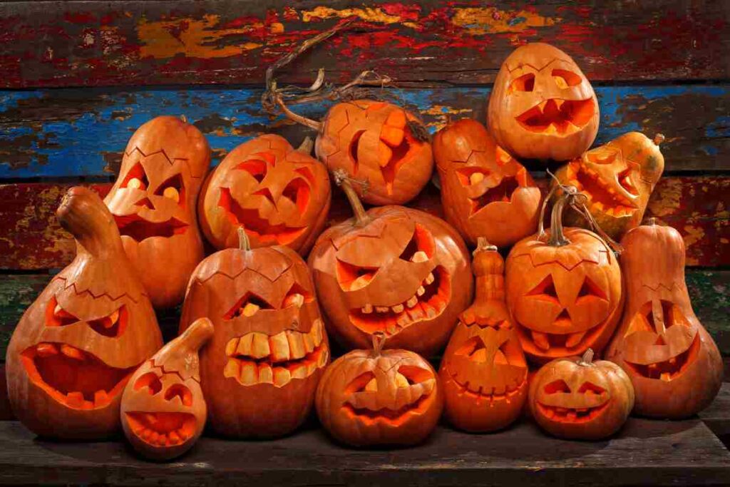 A pile of carved pumpkins