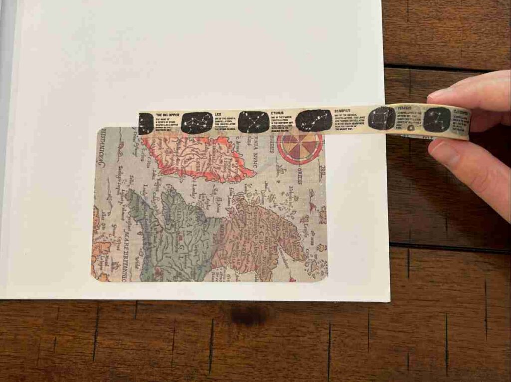 Adding washi tape to a scrapbooking project